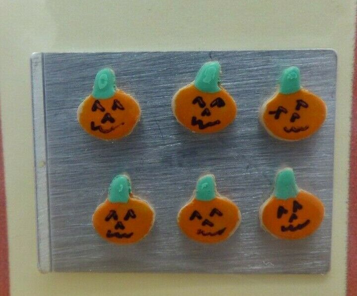 Handcrafted Dollhouse Miniature Jack-O-Lantern Cookies on Baking Sheet