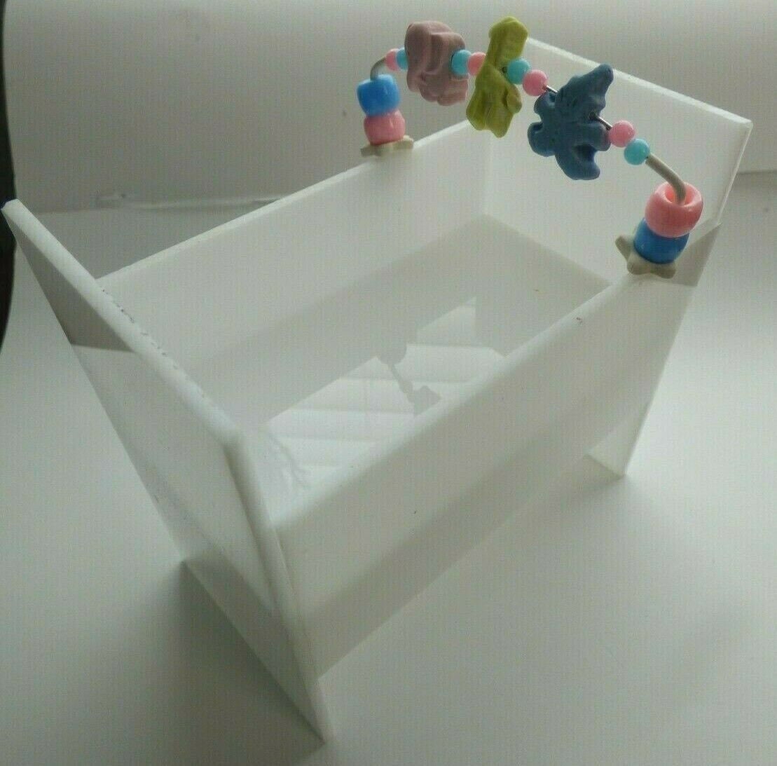 Dollhouse miniature acrylic baby crib with spinning toy by barb